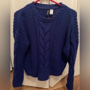 Blue knitted sweater